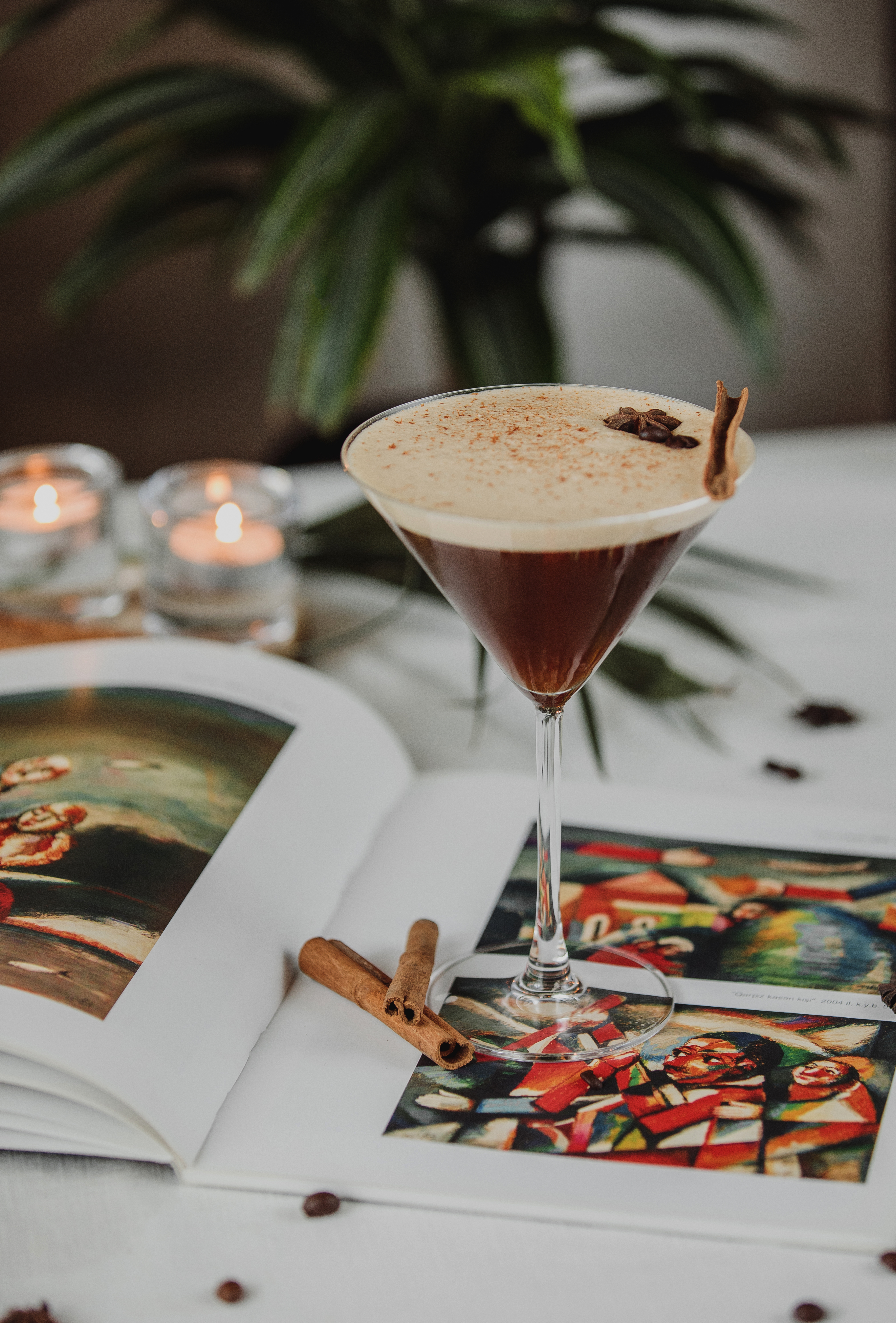 side-view-chocolate-martini-with-spices-cinnamon-glass-table